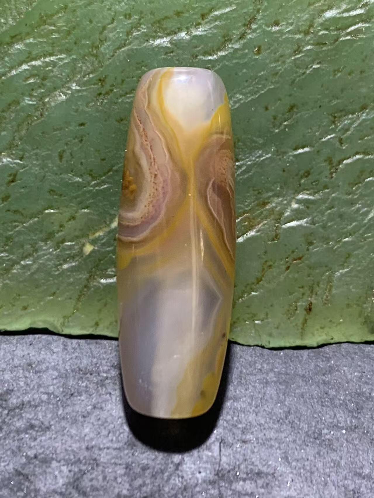 精美高玉化天眼纹巴西玛瑙随形桶珠一颗，