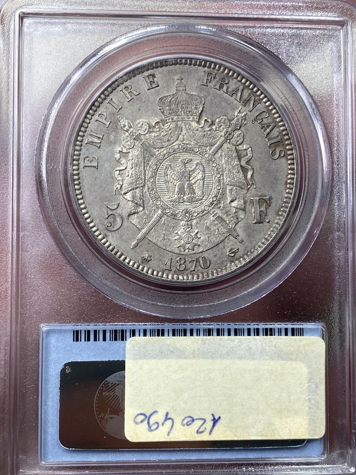 万国钱币拍卖第049期（万国夏季大拍） PCGS MS64 1870法国拿破仑三世纹章5法郎银币 虽是较常见品种 但是能到64分级别并不容易 原味纸袋包浆 PC老评水晶盒 状态极佳