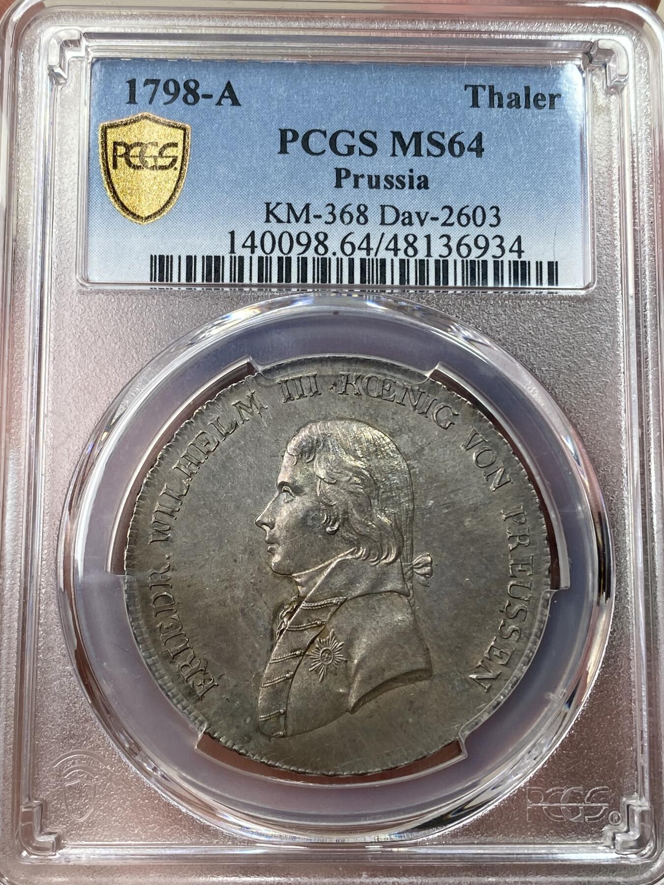 万国钱币拍卖第049期（万国夏季大拍） PCGS MS64 1798年德国普鲁士威廉三世野人护盾流通1泰勒 普鲁士名品之一 均匀德系淡彩 全深打高点极佳 绝对的收藏级品质 PC冠军分