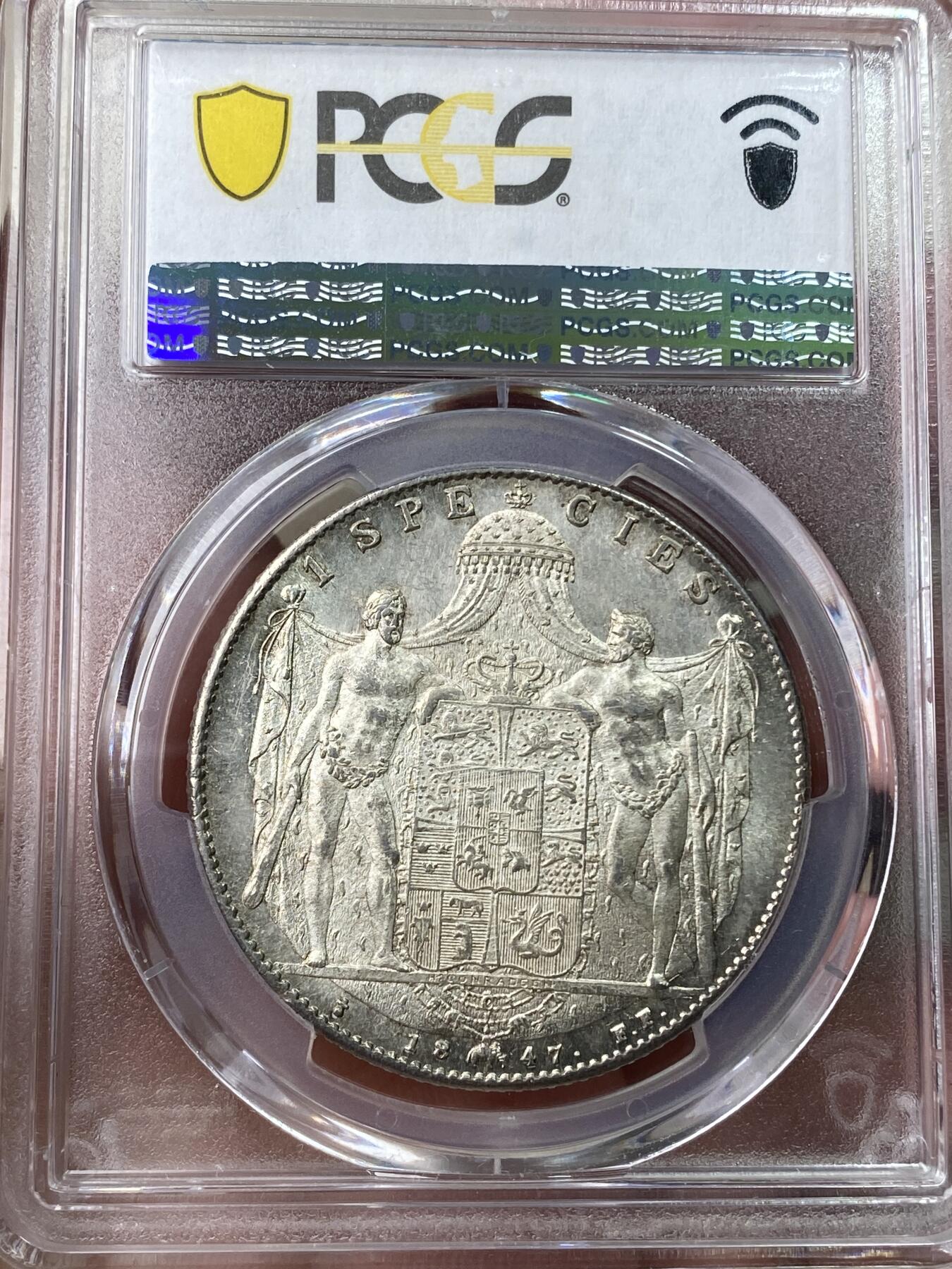 万国钱币拍卖第049期（万国夏季大拍） PCGS MS64 1847丹麦克里斯蒂安八世野人护盾达勒 设计非常出彩的一款北欧大银 野人纹章兼具了观赏性和趣味性 人像喷砂底板类镜面质感 PC唯一冠军。