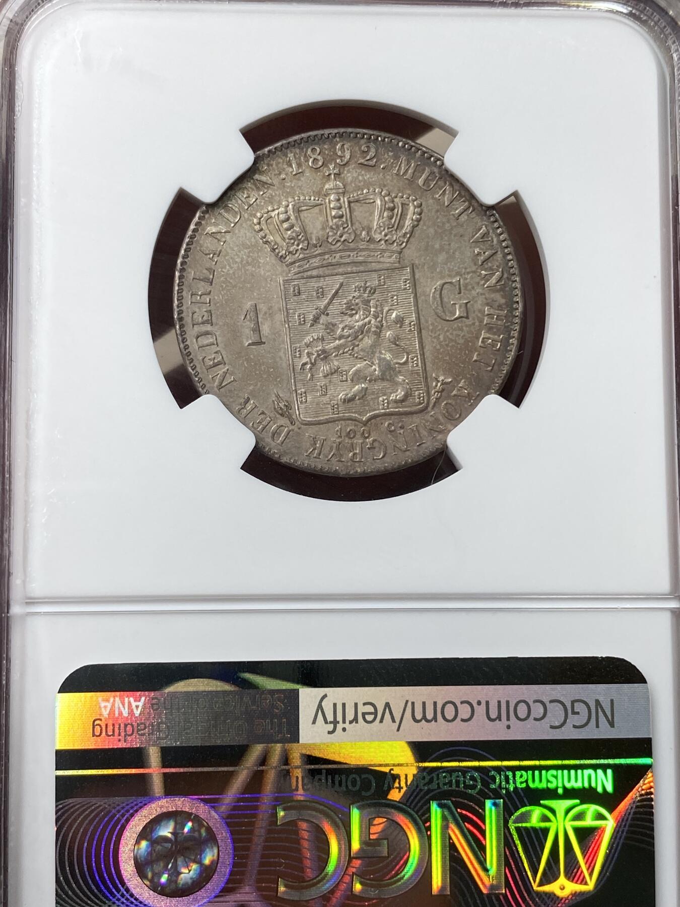 万国钱币拍卖第049期（万国夏季大拍） NGC MS65 1892年荷兰王国威廉敏娜女王少女头像1盾银币 极度舒适的原味深五彩BU级状态 少女发丝飘逸柔顺