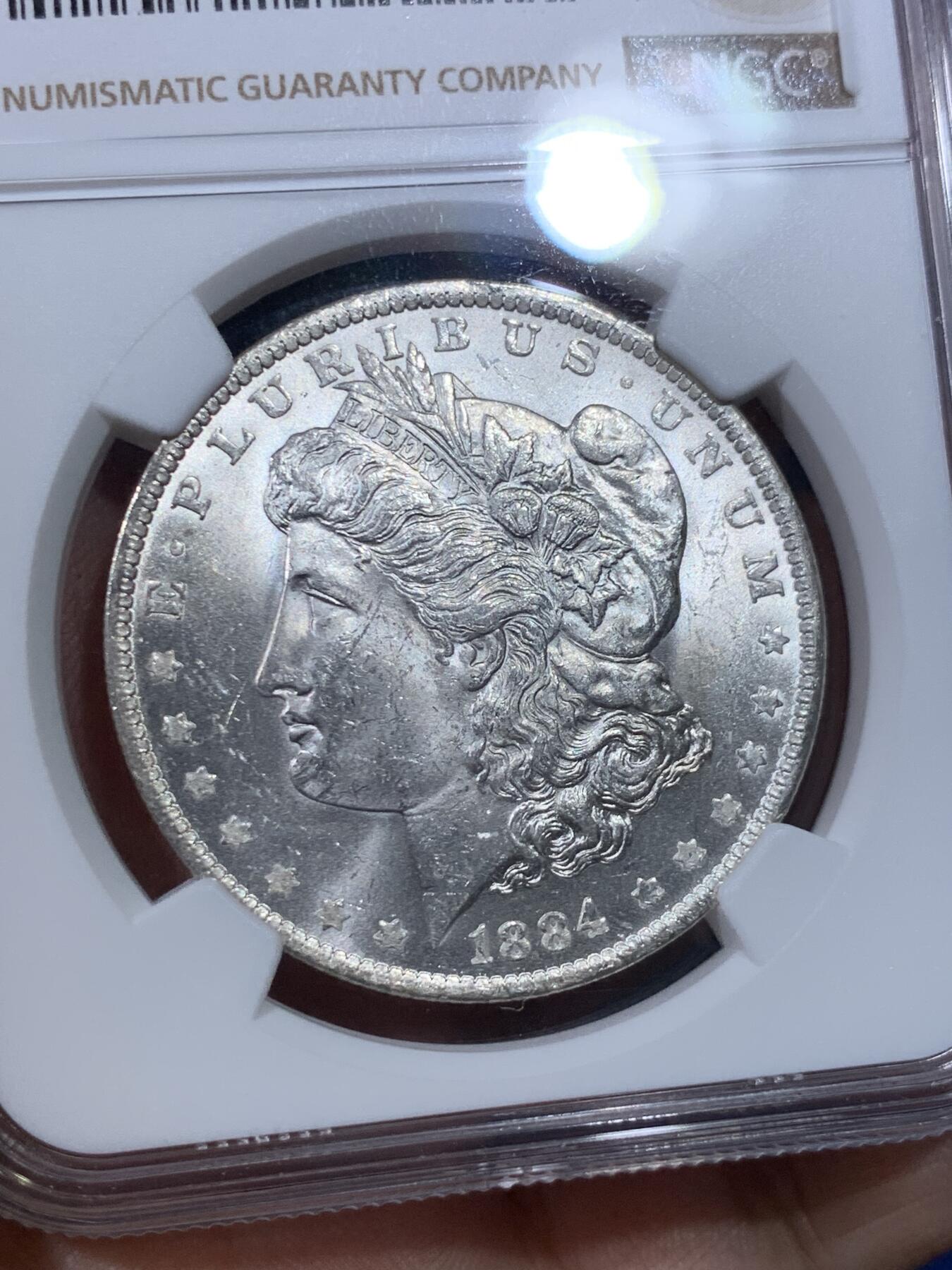 《竞宝斋》第398场 周日，周一，2场连拍 （全场包邮） NGC MS64 美国 1884 O版 摩根银元 光度好
