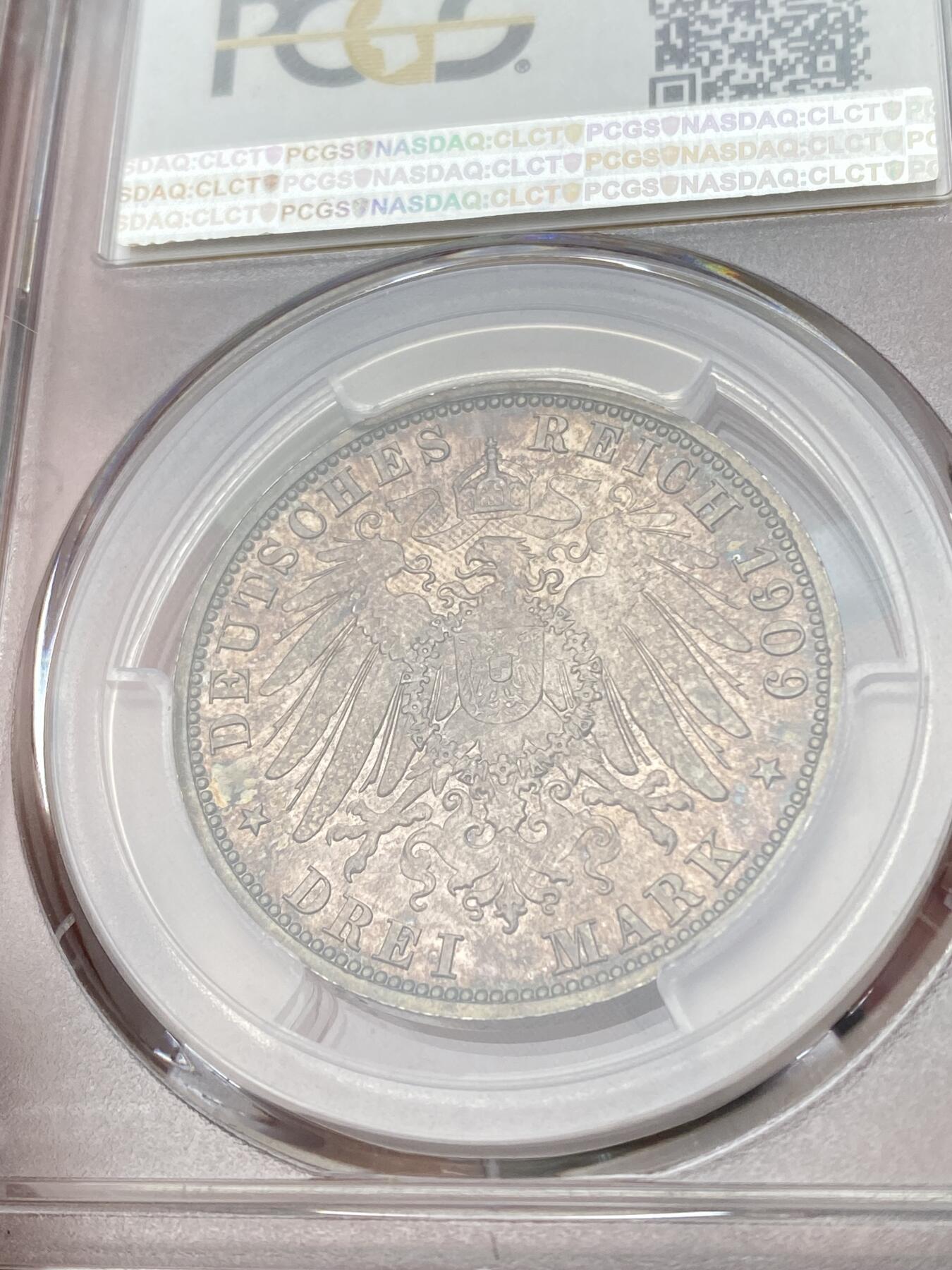 万国钱币拍卖第049期（万国夏季大拍） PCGS MS65 1909年德国罗伊斯-上格莱茨亲王国亨利二十四世长翅流通3马克 单年发行一万枚的小邦品种 此邦国没有发行过5马克 3马克便是最大银面值 原味幻彩BU品质 PC冠军分