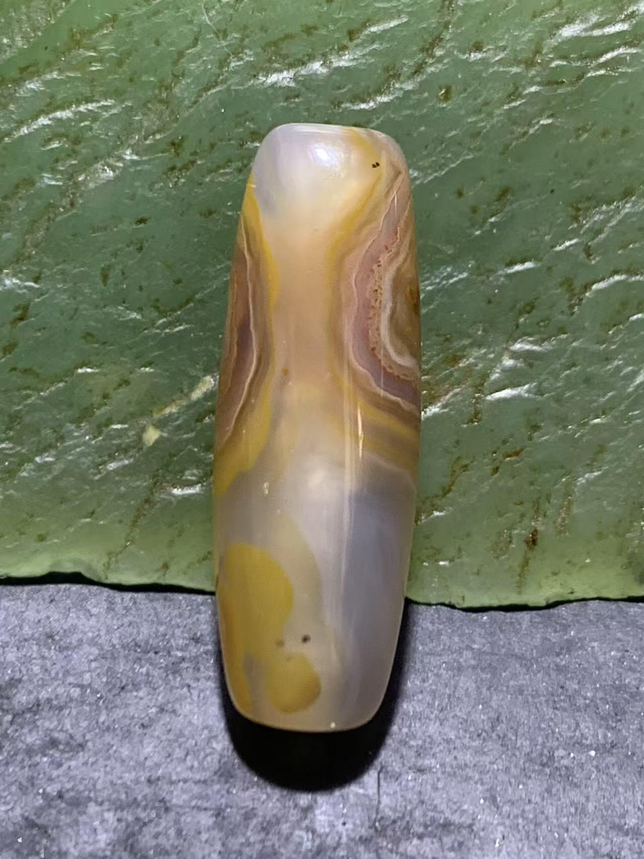 精美高玉化天眼纹巴西玛瑙随形桶珠一颗，