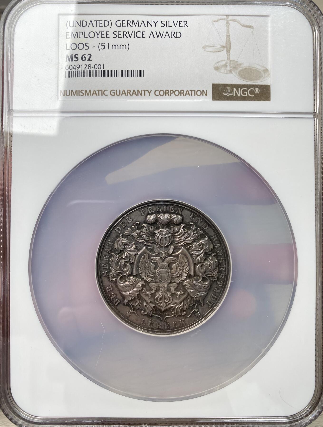 万国钱币拍卖第049期（万国夏季大拍） NGC MS62 1910年德国吕贝克忠诚服务纪念大银章 老五彩镜面高浮雕吕贝克双头鹰 边铭990银 51MM 60.3G大规格