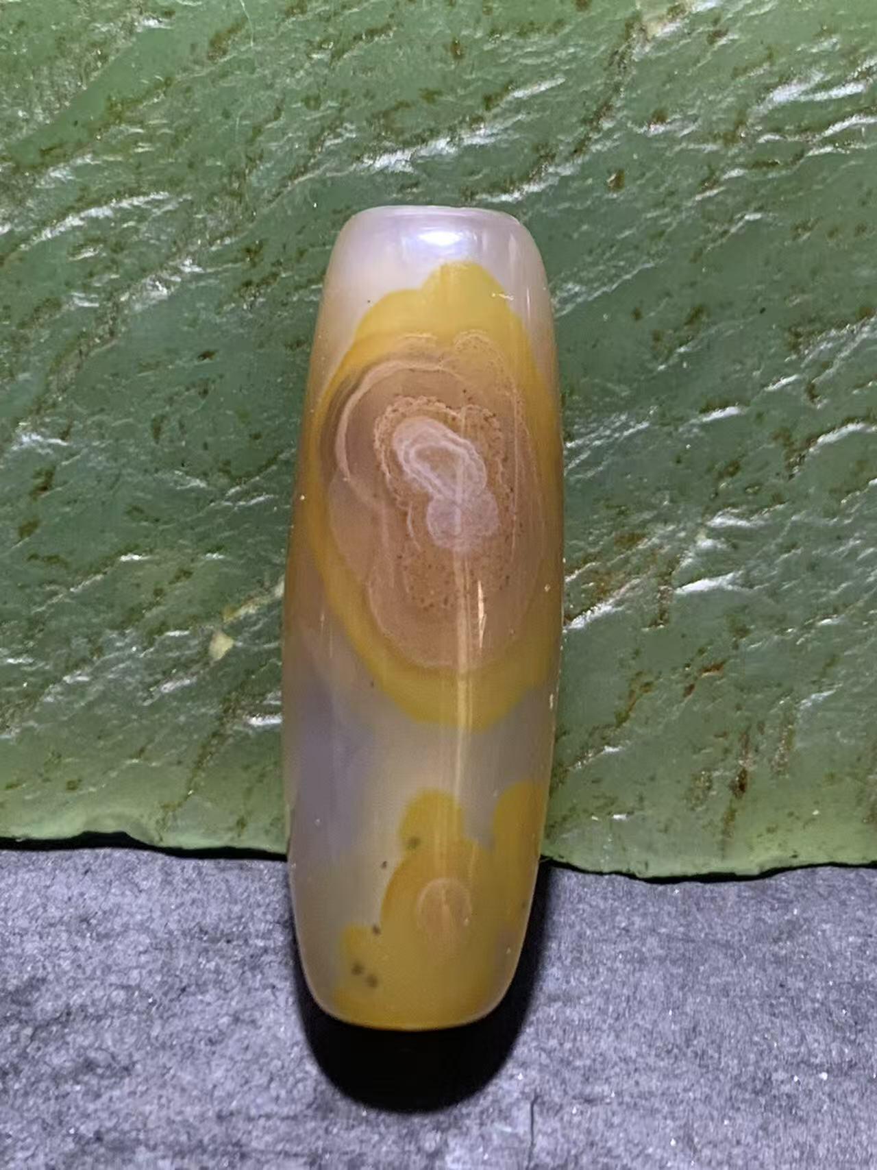 精美高玉化天眼纹巴西玛瑙随形桶珠一颗，