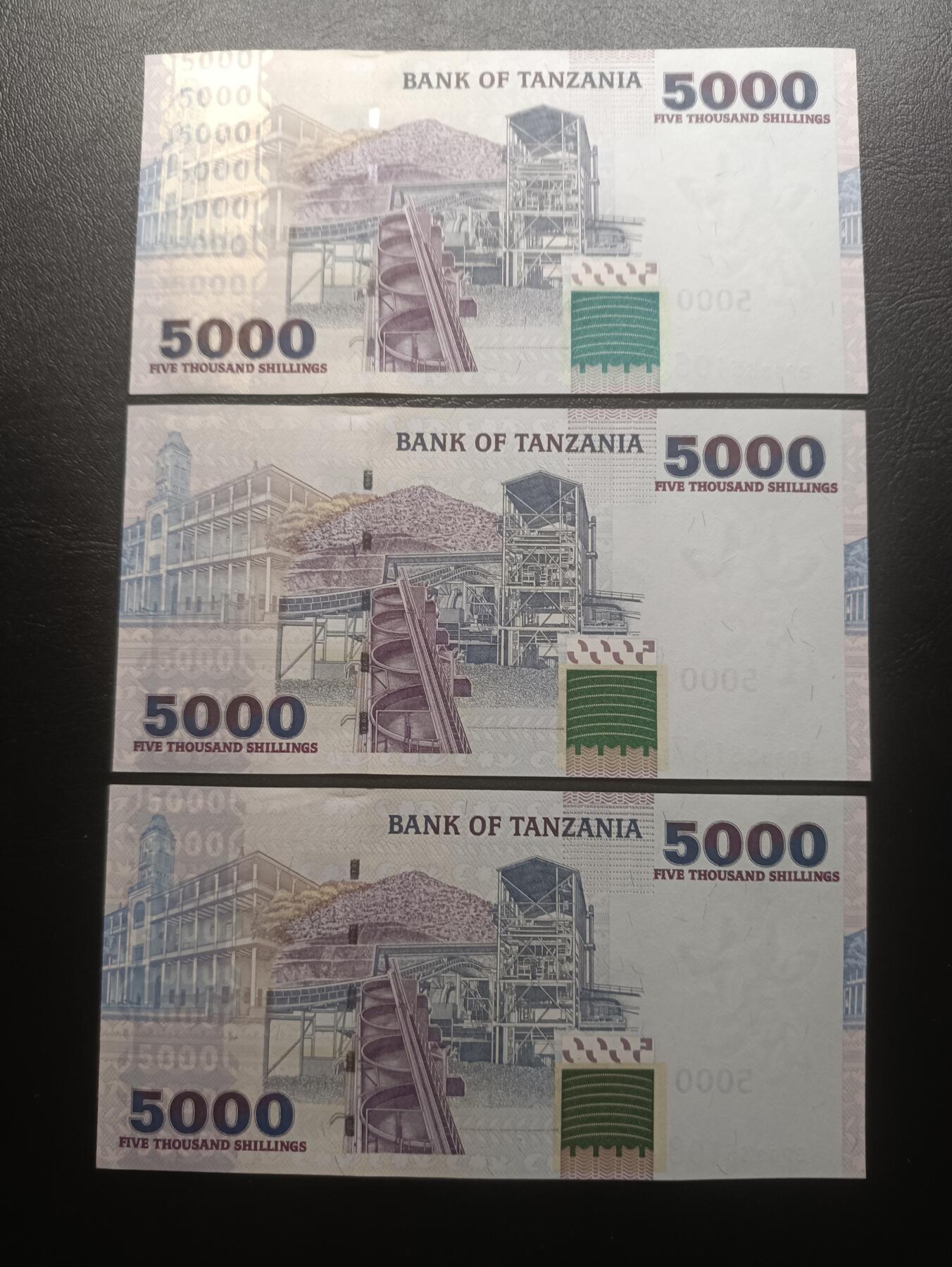 2025七月第一期（总第183期） 坦桑尼亚2003版5000先令UNC批量三连号，犀牛和工厂