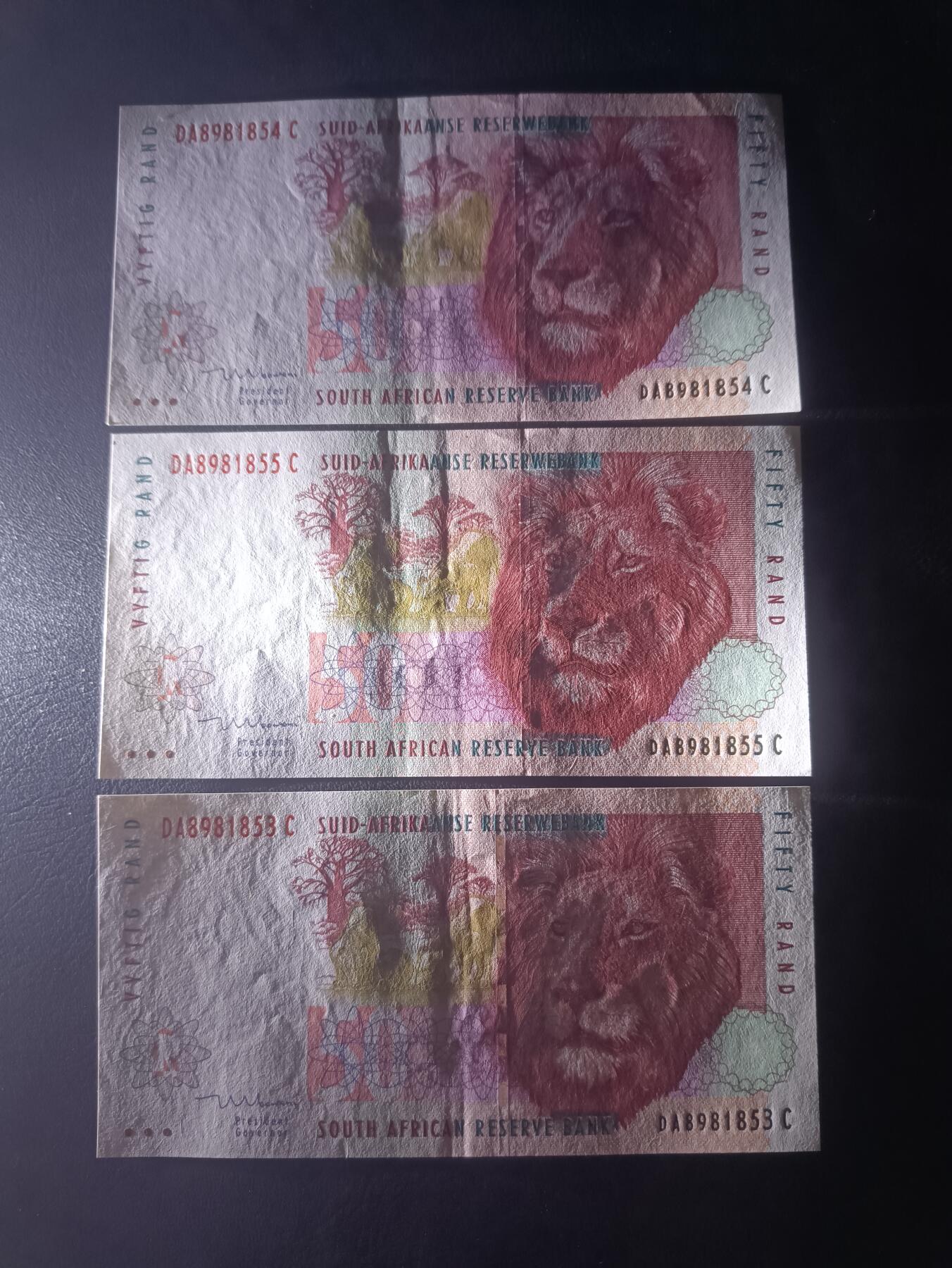 2025七月第一期（总第183期） 南非1999年50兰特AUNC批量三连号，后期二签，非洲狮