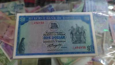 世界钱币～微拍第188期暨2025年第27期  存货清理 1979年罗德西亚1元 全新绝品尾号938