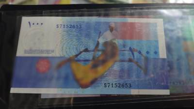 世界钱币～微拍第188期暨2025年第27期  存货清理 2006年科摩罗1000法郎 全新绝品无4