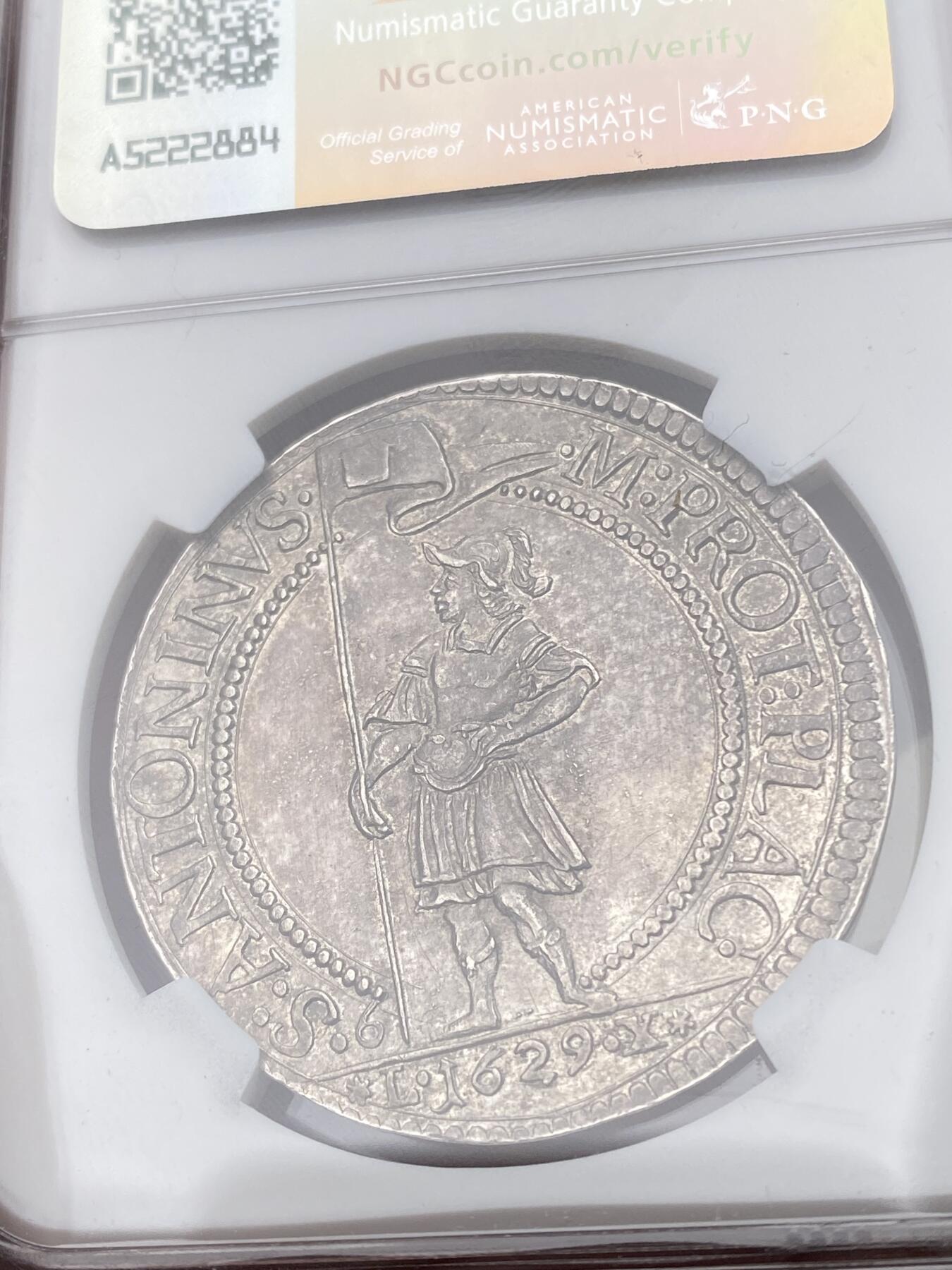 万国钱币拍卖第049期（万国夏季大拍） NGC MS62 意大利1629年法尔内塞家族SCUDO大银币 皮亚琴察铸。正面为穿着戎装的奥多阿尔多一世·法尔内塞，背面为雇佣兵打扮的守护圣人，将守护圣人极度世俗化，受到了家族成员和民众的推崇，导致流通非常充足，连博物馆都见不到品相完美的样本。此枚包浆均匀，底光犹存，NGC最高分，极其难得的一枚意系藏品。