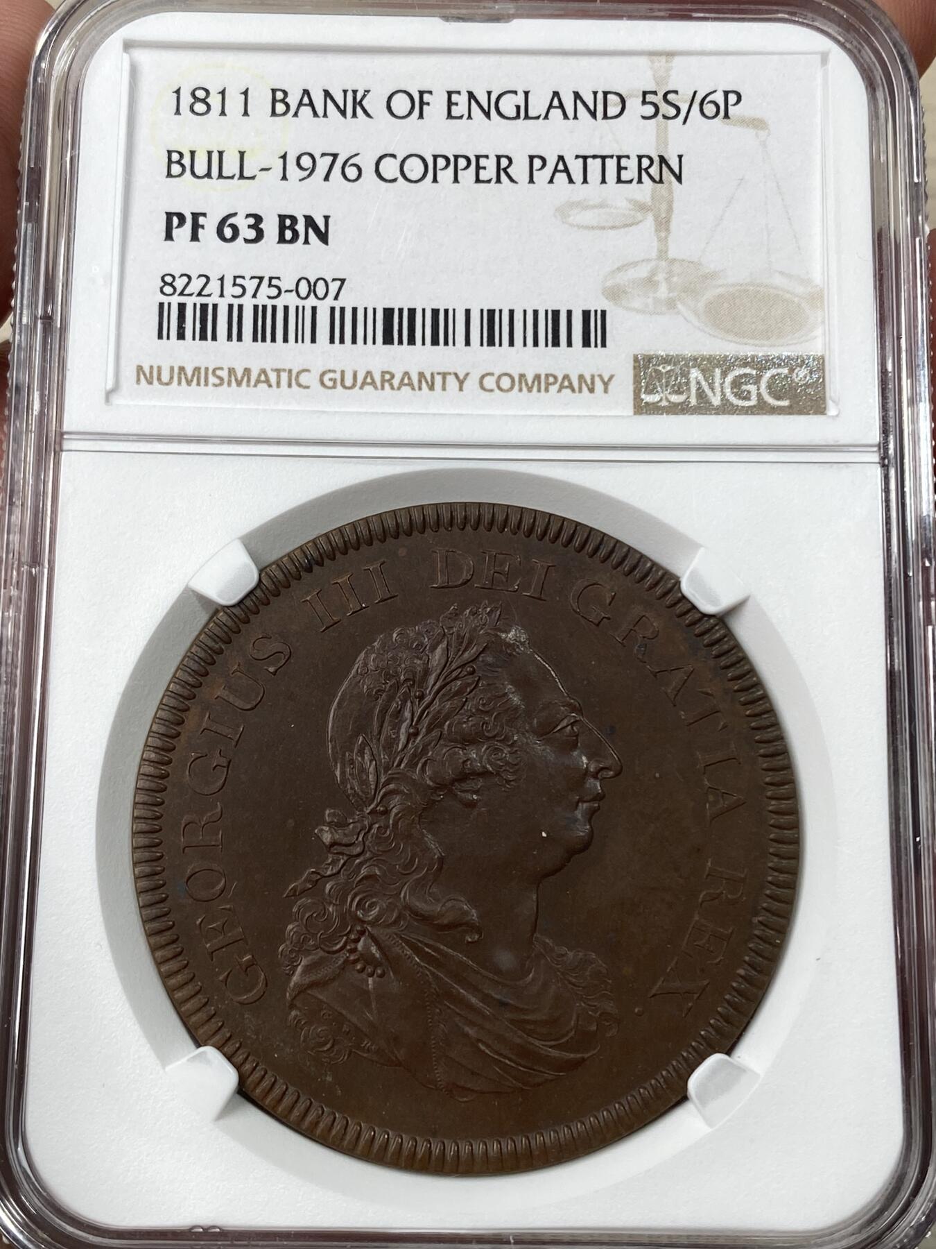 万国钱币拍卖第049期（万国夏季大拍） NGC PF63BN 1811英国英格兰银行乔治三世5先令6便士铜样币 英格兰银行罕见品种 坐像不列颠尼亚女神 银质价格极高 铜样也不失为一个选择。