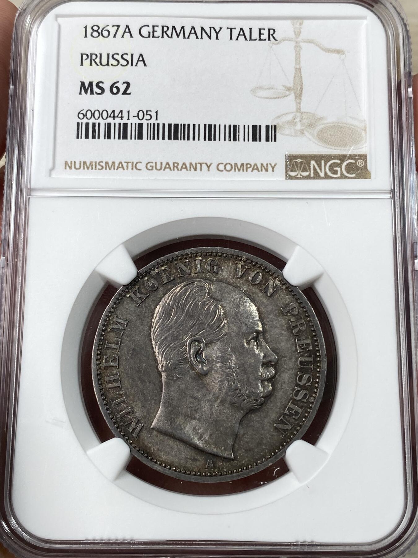 万国钱币拍卖第049期（万国夏季大拍） NGC MS62 1867年德国普鲁士威廉国王帝国鹰流通1泰勒 经典德国一手卷藏酱彩 犀利锋利感极强