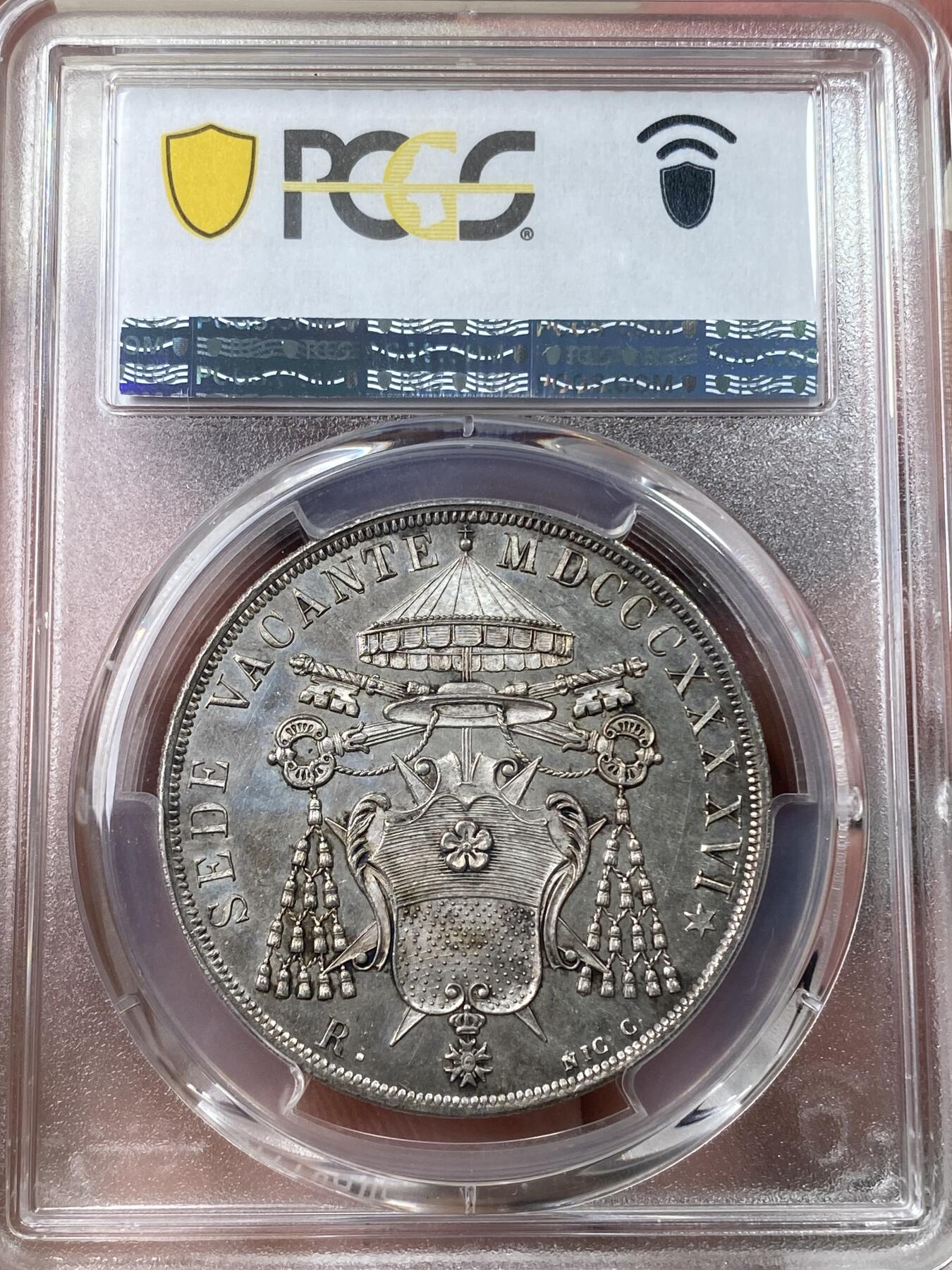 万国钱币拍卖第049期（万国夏季大拍） PCGS MS64 NGC MS64 1846年教皇国教宗缺位斯库多大银 罗马厂铸造，单年发行4000枚，无论是打制还是包浆都非常到位的一枚，类镜面五彩，PC亚军分，更高分仅一枚，典藏级品质。上个月NAC一枚63分到手约人民币1.9万。