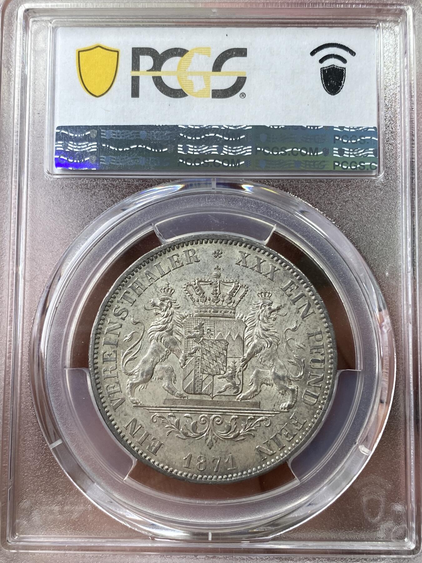 万国钱币拍卖第049期（万国夏季大拍） PCGS AU58 1871年德国巴伐利亚路德维希二世双狮护盾流通1泰勒 罕见的J.Ries版胜利泰勒头像 区别之前的G.Voigt版头像 可以说是路二1泰勒中最难的一版 原味欧陆纸袋包浆 欧拍价格非常猛烈的罕见品种