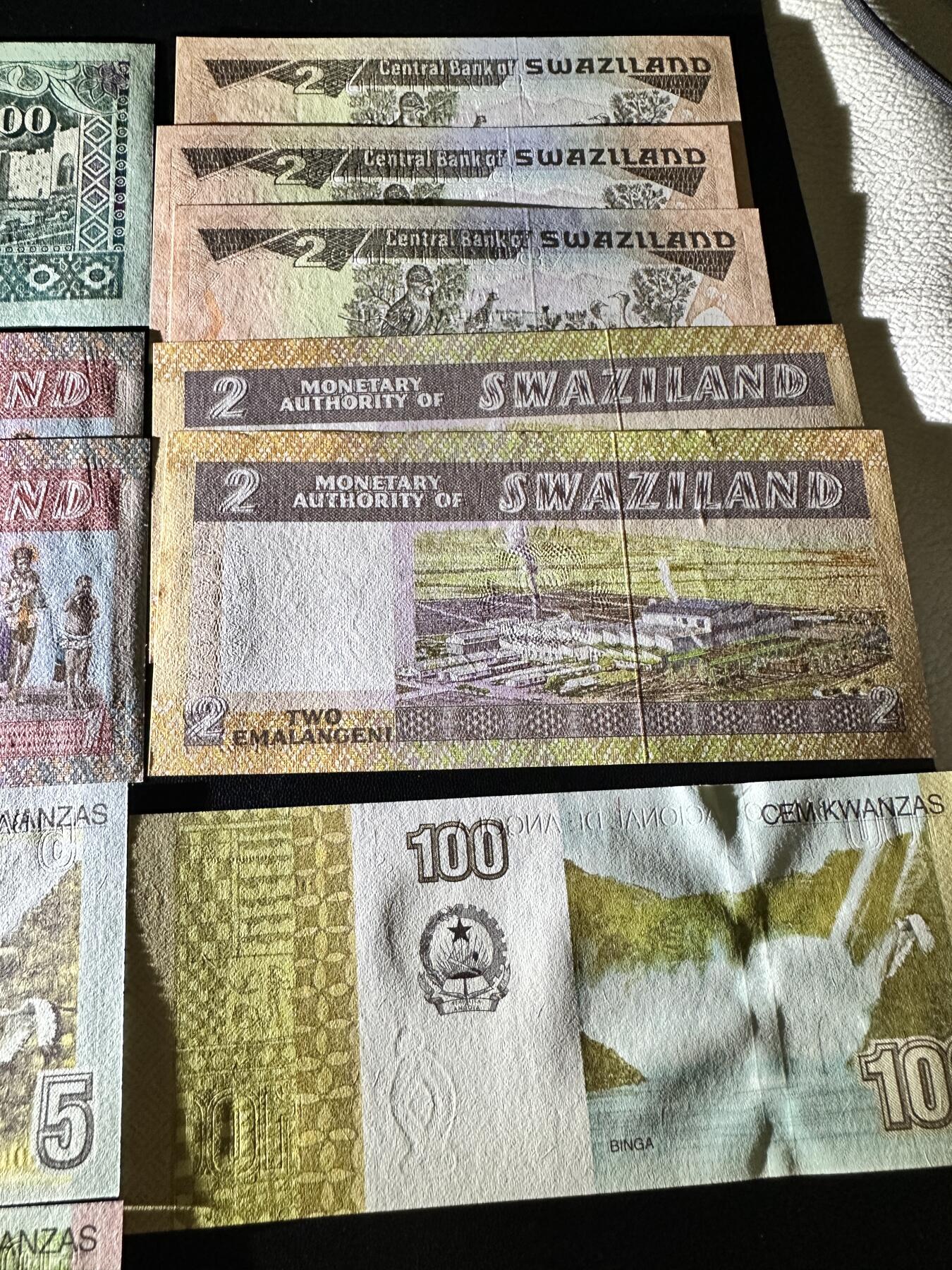 《外钞收藏家》第五百四十四期（本期大蚂蚁、英镑首发、港币等精品以及品种丰富的裸币）（本平台长期征集拍品、欢迎藏友们联系合作） 也门、斯威士兰、安哥拉 11张一起 全新UNC