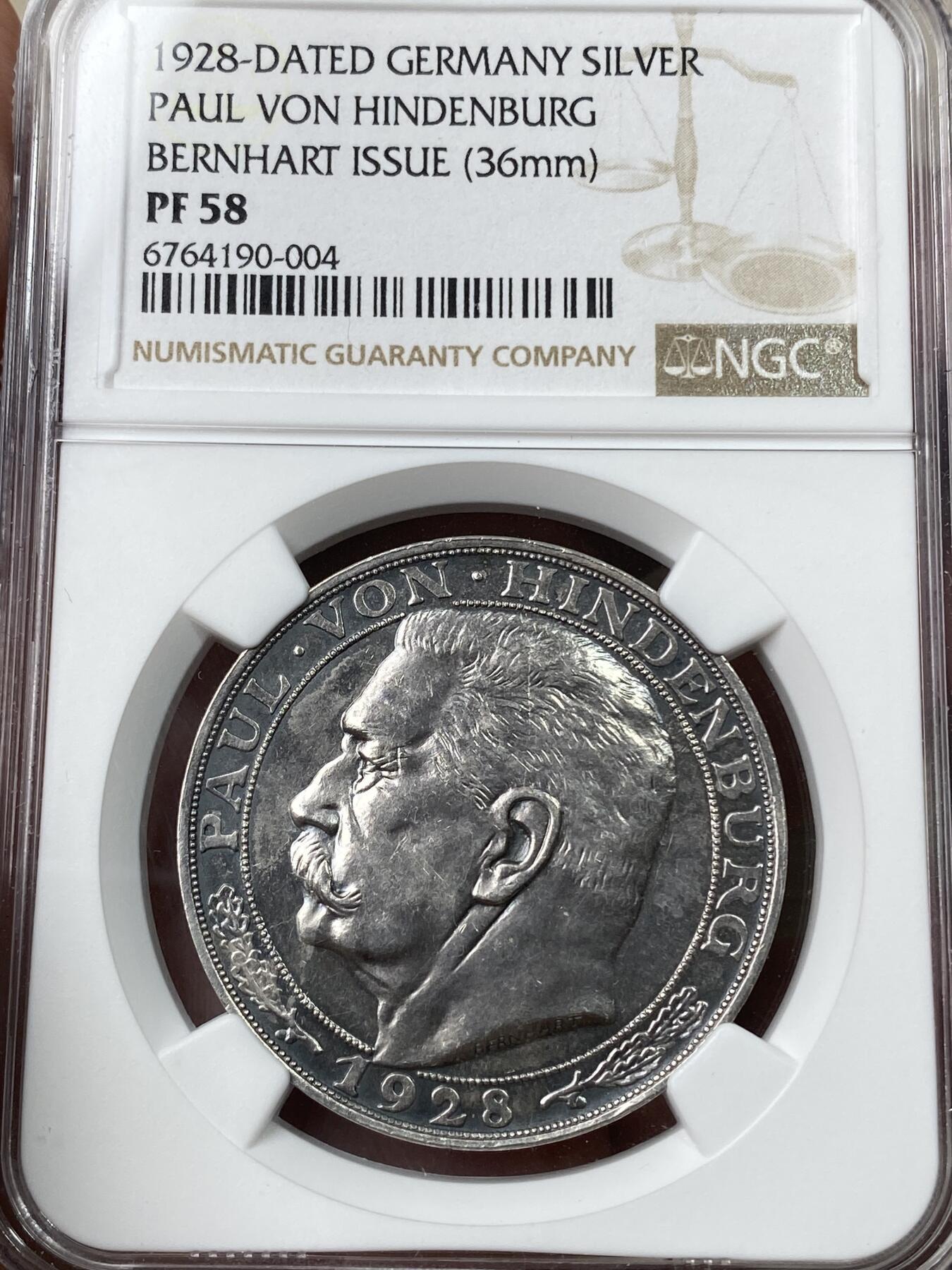 万国钱币拍卖第049期（万国夏季大拍） NGC PF58 1928年德国魏玛共和国兴登堡总统5马克币章 伯恩哈特设计经典左脸像 精制黑彩锋利感十足