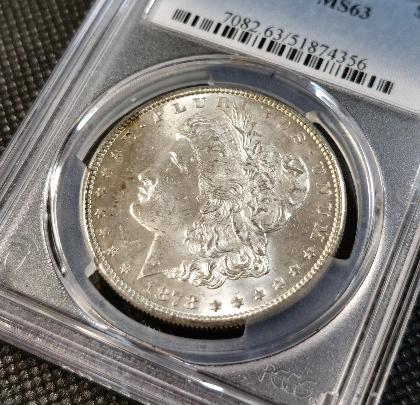  甄臻铺-世界币章拍卖（第24期），送拍享返佣金等优惠多多 PCGS-MS63 美国1878年S版摩根，摩根铸造首年，铸造极好。