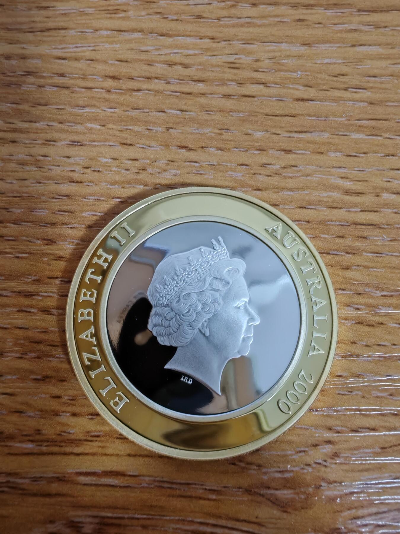 长老汇蛇年精选第十九场拍卖 2000澳大利亚千禧年（现在）10元部分镀金精制银币，克书标价200美金
