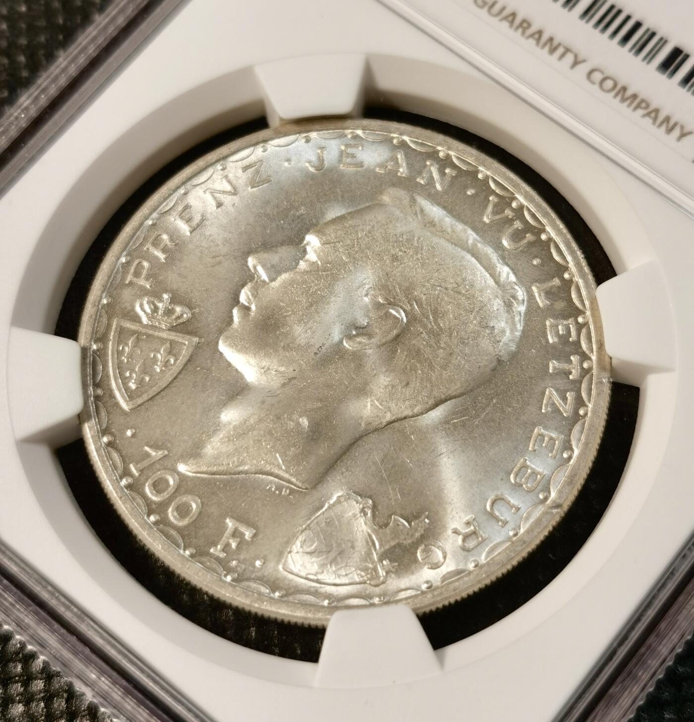  甄臻铺-世界币章拍卖（第24期），送拍享返佣金等优惠多多 NGC-MS65 卢森堡1946年盲人约翰100法郎大银币 卢森堡的大马剑，中世纪骑士策马冲锋，细节精美，图案题材难得，高分可藏
