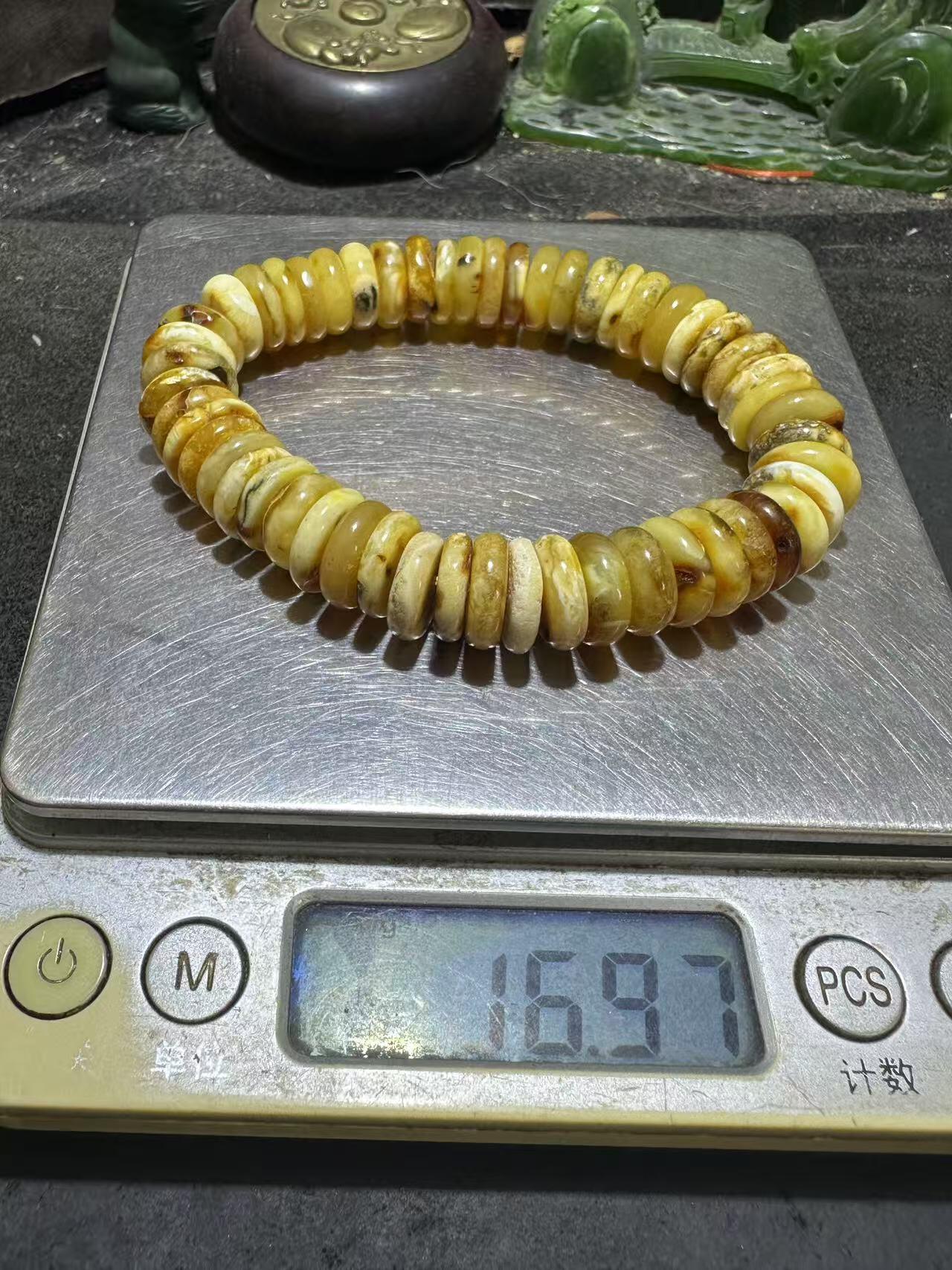 天然乌料蜜蜡隔片手串1条！，