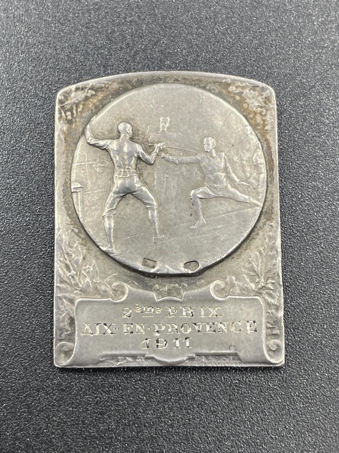 「木头集藏」章牌精品专场！ 1911年法国击剑竞赛银方章，尺寸：28×21mm，10g，边铭：菱形厂标 野猪头银标 ARGENT，背面刻画很美，体育竞技如崖上摘花，少见银章。