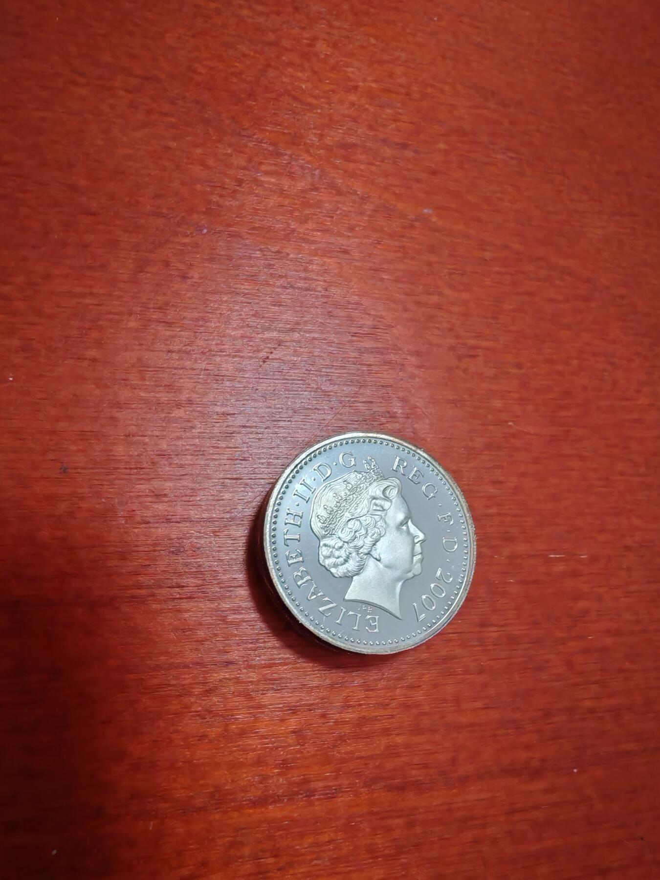 长老汇蛇年精选第十九场拍卖 2007英国桥1英镑精制加厚银币，量少