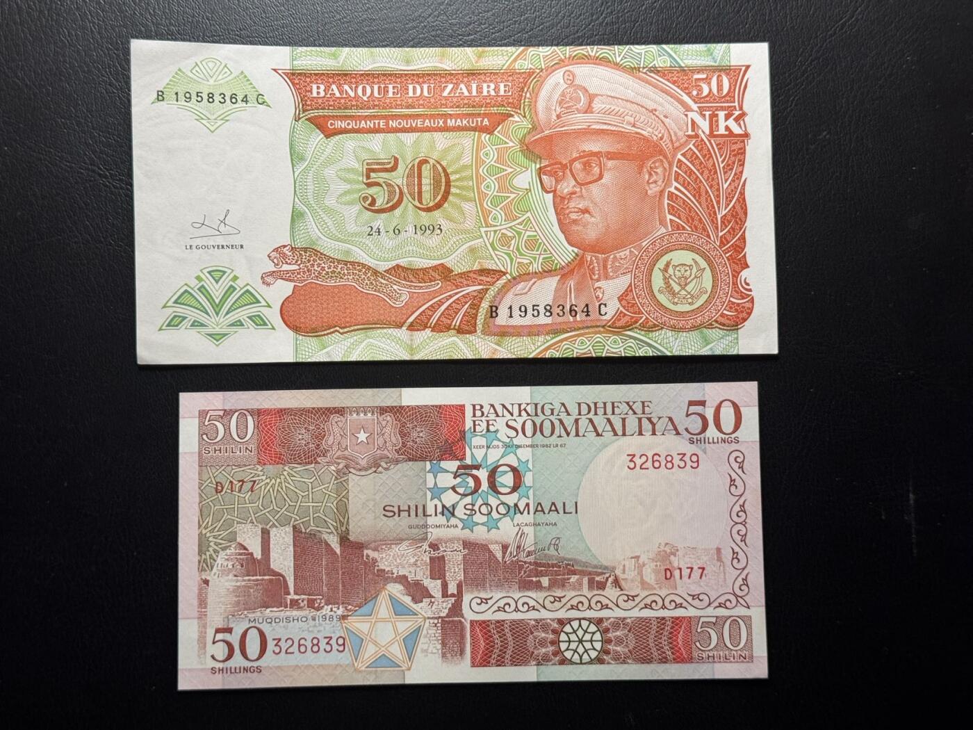 八十五场 索马里和扎伊尔一组两张，品相unc-。少见品种！