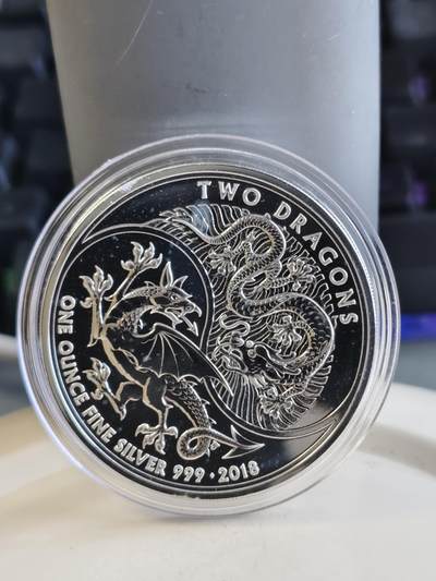 第165期拍卖【长期征集拍品】 - 英国2018年两条龙2英镑1盎司纪念银币，999银