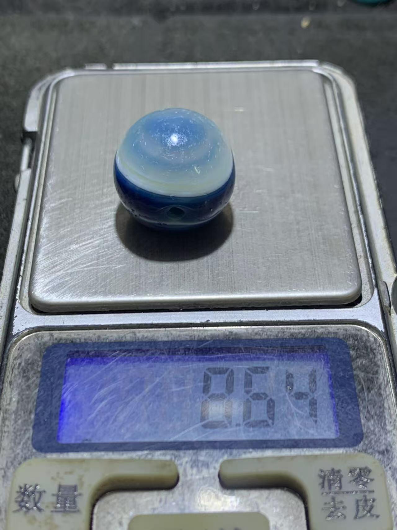 精美高玉化风化纹天眼缠丝玛瑙随形珠一颗。，