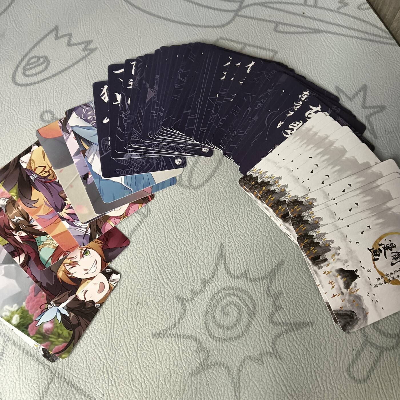 花开卡拍第30期（7月13号周日截拍，品控勿拍!!!拍品不寄存，运费5元，自制卡难免瑕疵，可能存在轻微撞角爆边等出厂瑕疵，品控介意勿拍！） 金庸漫画典藏收藏卡55张，拆封