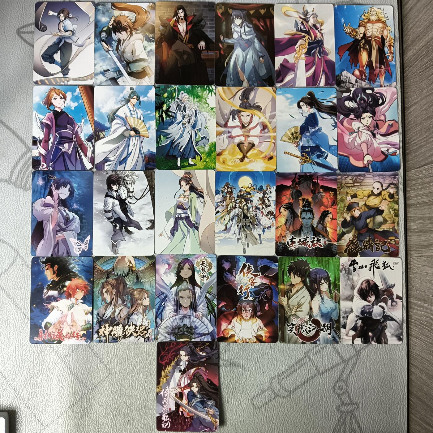 花开卡拍第30期（7月13号周日截拍，品控勿拍!!!拍品不寄存，运费5元，自制卡难免瑕疵，可能存在轻微撞角爆边等出厂瑕疵，品控介意勿拍！） 金庸漫画典藏收藏卡55张，拆封