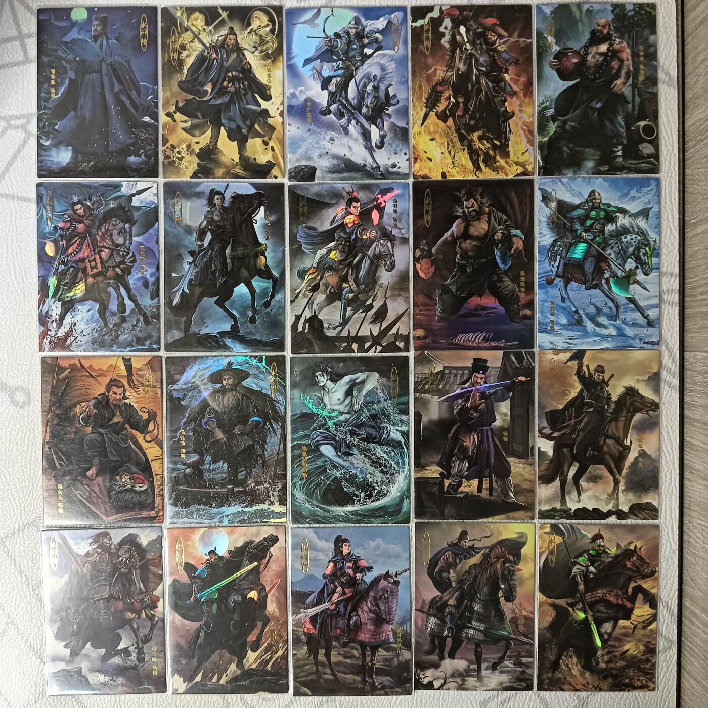 花开卡拍第30期（7月13号周日截拍，品控勿拍!!!拍品不寄存，运费5元，自制卡难免瑕疵，可能存在轻微撞角爆边等出厂瑕疵，品控介意勿拍！） 大圣卡通 司马金装四大1-8弹 水浒部分40张 彩闪