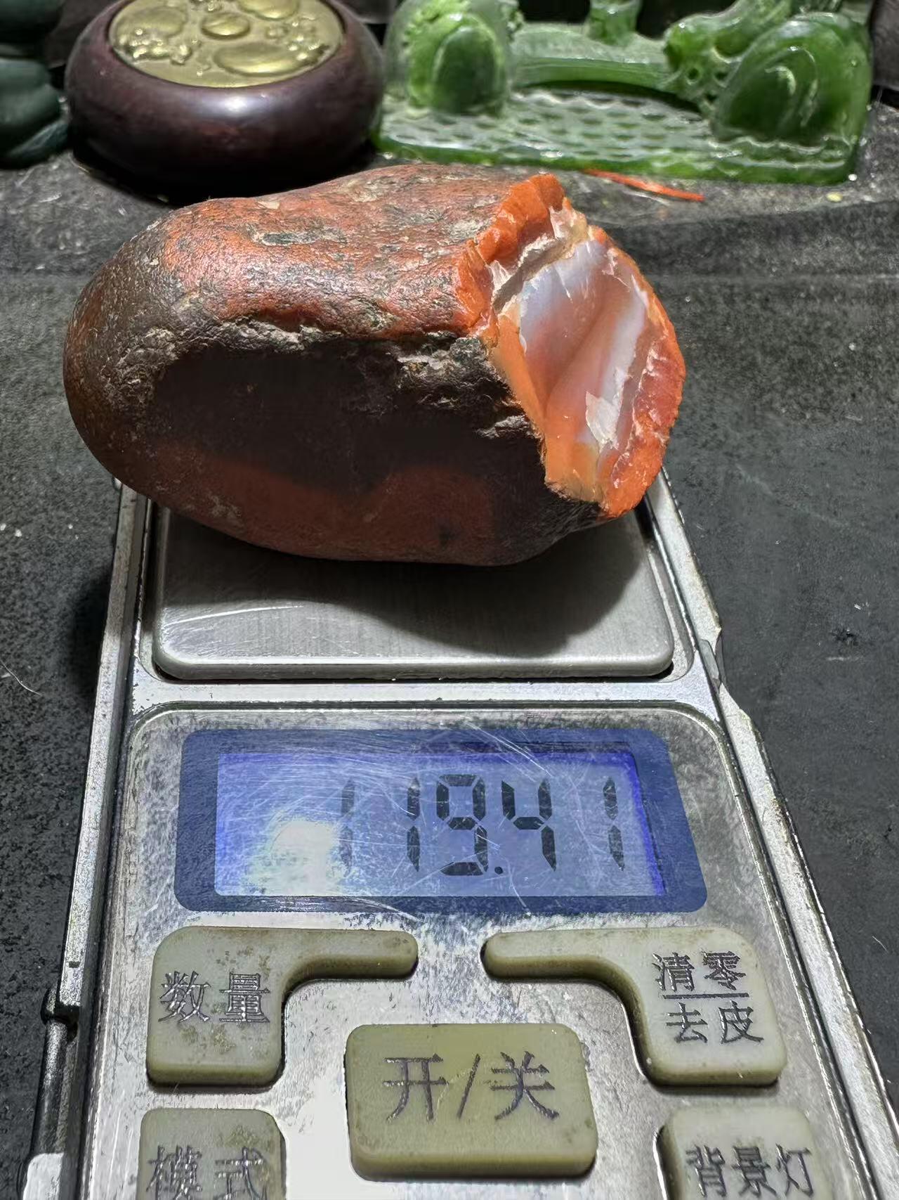 精美柿子红皮开窗料红白双色南红玛瑙原石一颗