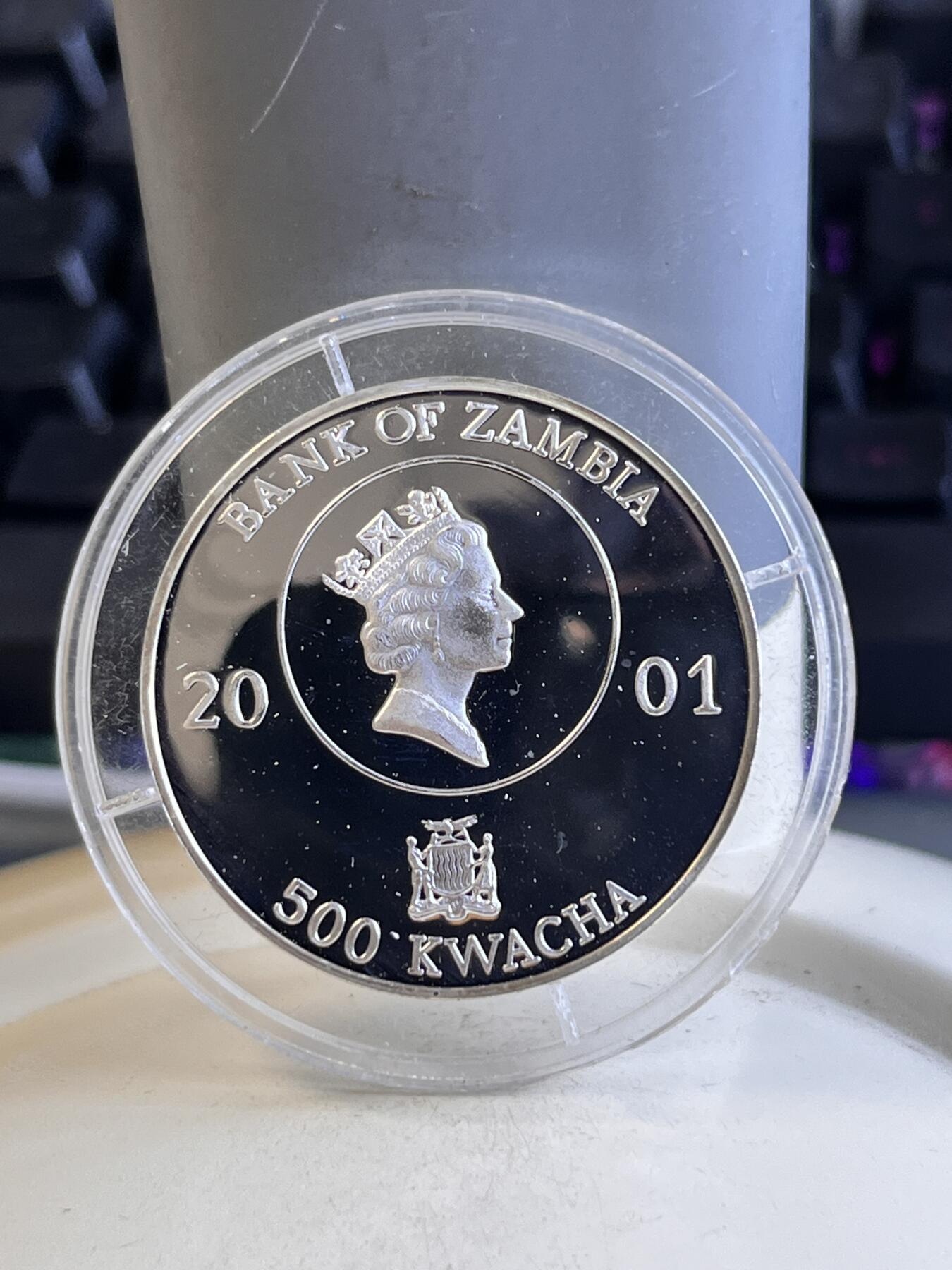 第166期拍卖【长期征集拍品】 赞比亚2001年世界杯足球纪念银币，999银，15克
