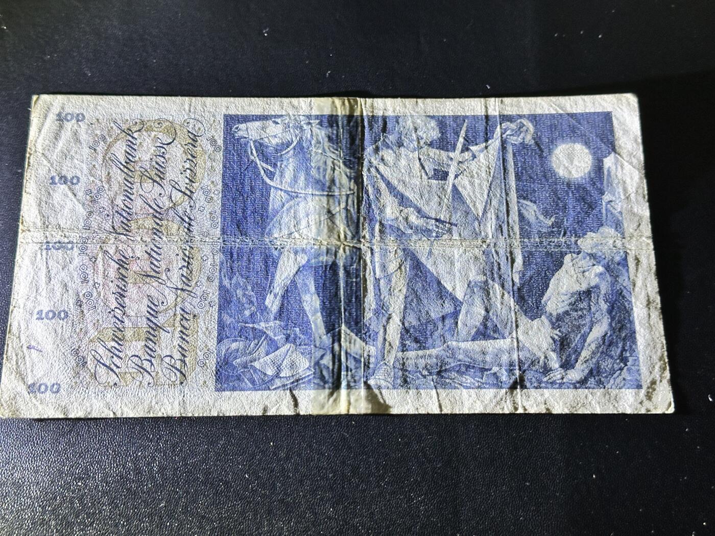《外钞收藏家》第五百四十六期（本期有精品银币、以及稀少裸币和热门评级币）（本平台长期征集拍品、欢迎藏友们联系合作） 1967年瑞士100法郎 割袍 非全新 品相如图