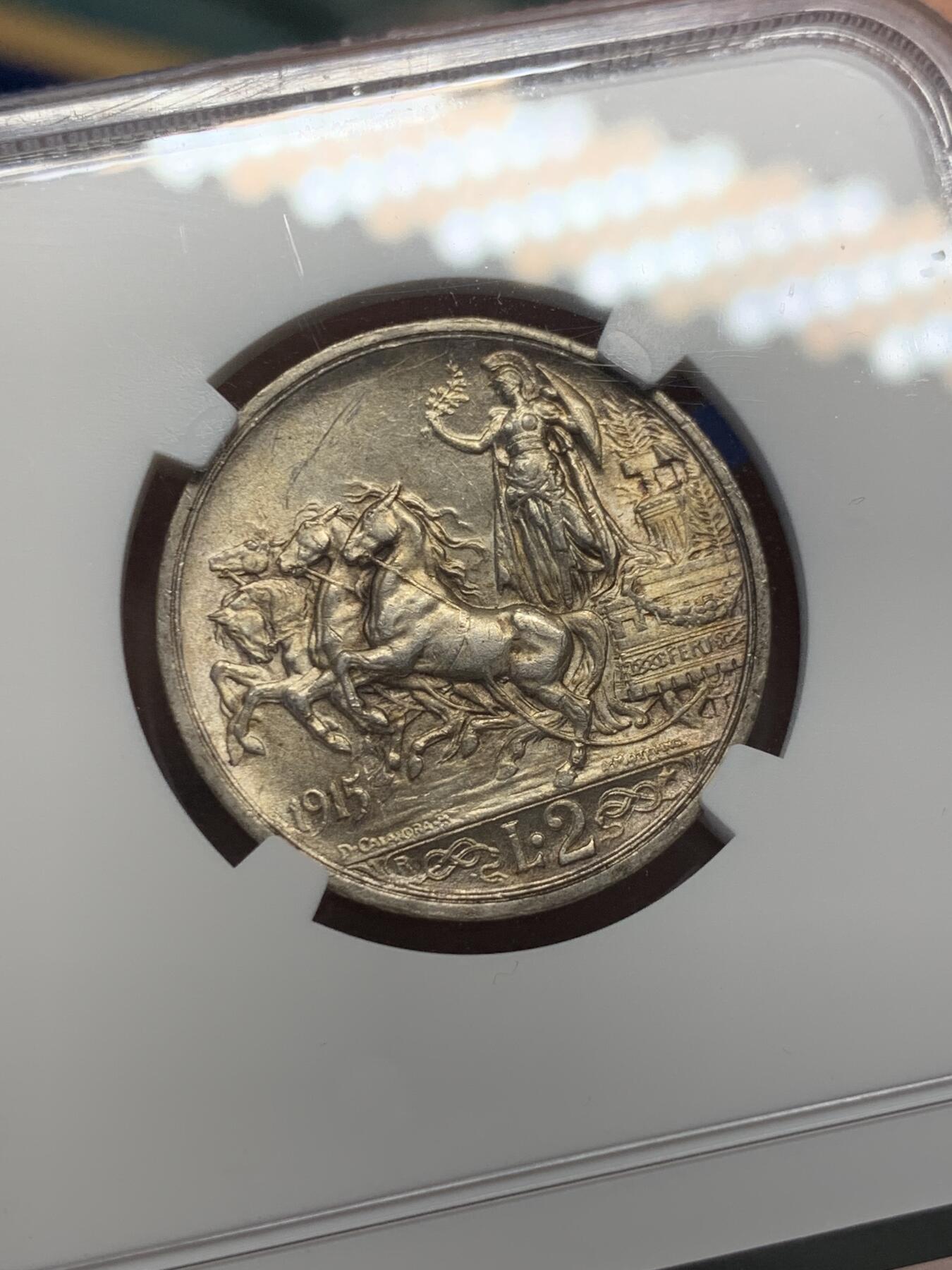 《竞宝斋》第400场 周日，周一，周二，3场连拍 （全场包邮） NGC UNCD 意大利1915年马车2里拉银币 原光包浆淡彩