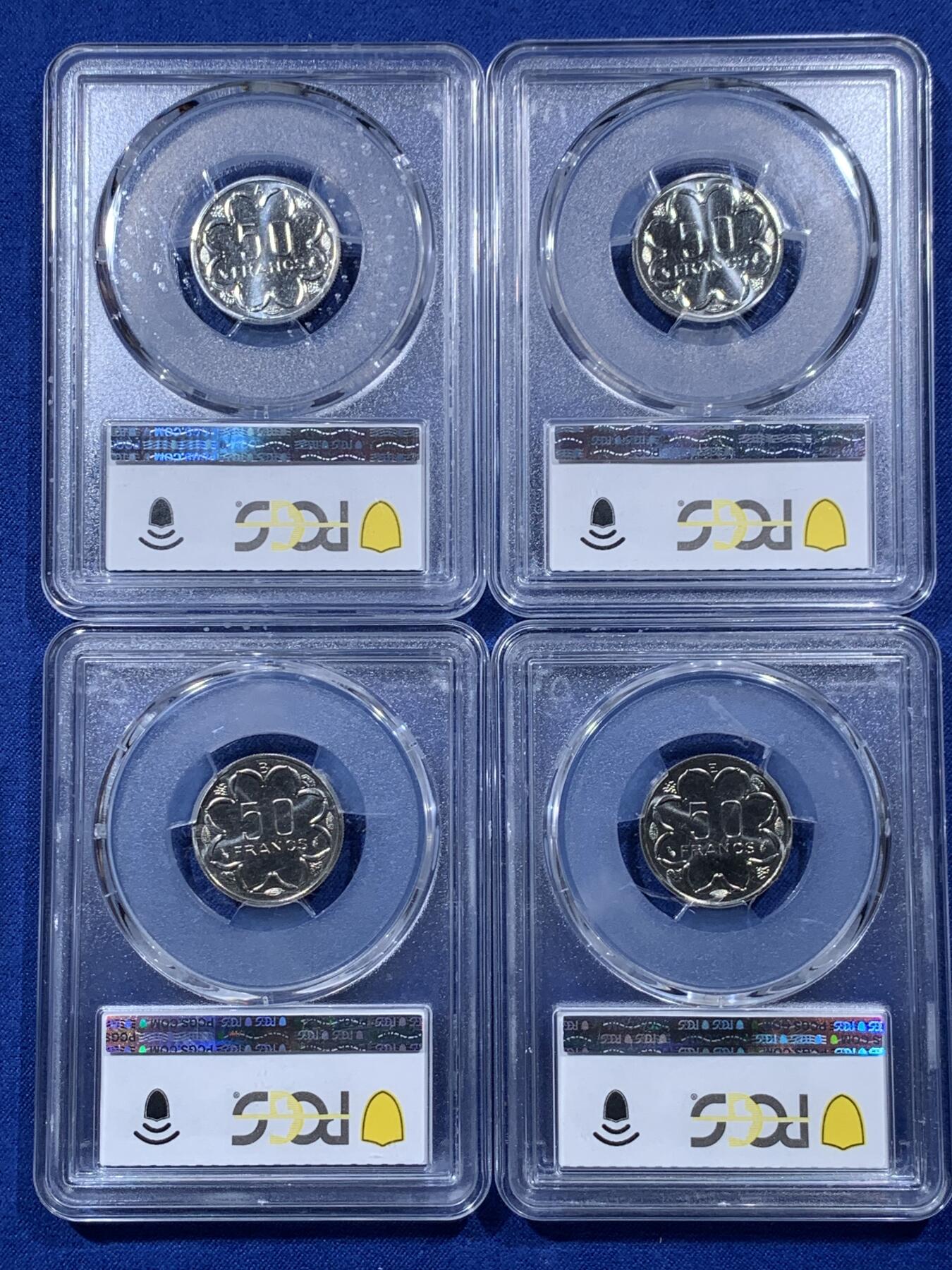 《竞宝斋》第400场 周日，周一，周二，3场连拍 （全场包邮） PCGS MS68-69 中非50法郎样币 ABDE四枚厂别套装 光泽璀璨，四枚样币展现不同铸造厂别标记，币面细节极致清晰，边缘锐利完好。整体保存状态卓越，体现中非货币铸造工艺的多样性与精湛技艺 50分盒子小磕