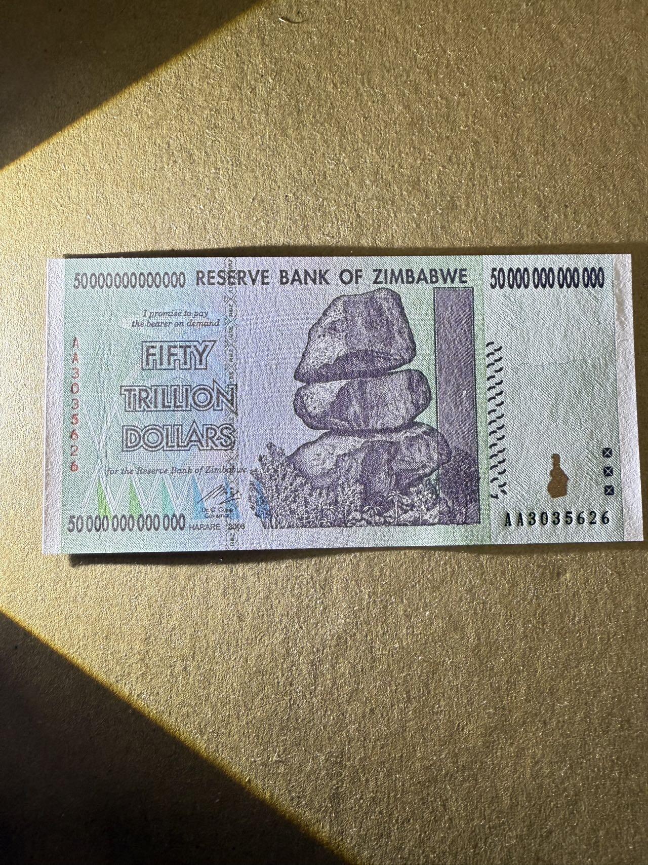 【炜奕收藏】，第三十九期 2008年津巴布韦50万亿元，UNC品相，号码无47