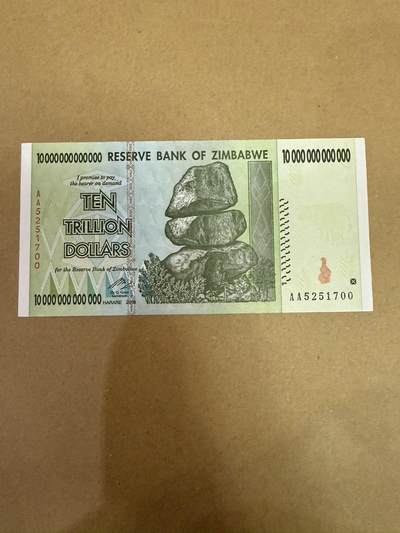 【炜奕收藏】，第三十九期 - 2008年津巴布韦10万亿元，UNC-品相，轻微压痕