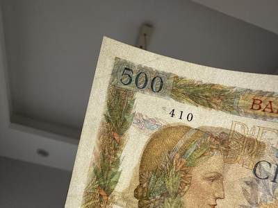 《外钞收藏家》第五百四十七期（本期稀少裸币、刀币、精品评级）（本平台长期征集拍品、欢迎藏友们联系合作） 1942年法国500法郎  非全新 品相如图