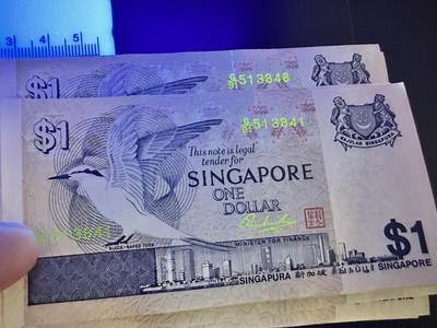 《外钞收藏家》第五百四十七期（本期稀少裸币、刀币、精品评级）（本平台长期征集拍品、欢迎藏友们联系合作） 新加坡鸟版1元 标准10连号（41-50）全新 有轻微潮斑