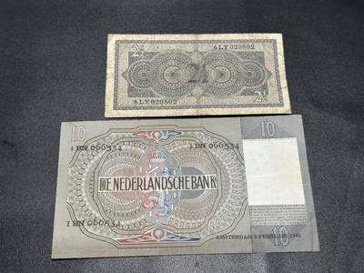 《外钞收藏家》第五百四十七期（本期稀少裸币、刀币、精品评级）（本平台长期征集拍品、欢迎藏友们联系合作） 1949年荷兰2.5和10盾 两张一起 非全新 品相如图