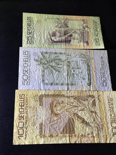 《外钞收藏家》第五百四十七期（本期稀少裸币、刀币、精品评级）（本平台长期征集拍品、欢迎藏友们联系合作） 塞舌尔25、50、100卢比  三张一起 非全新 品相如图