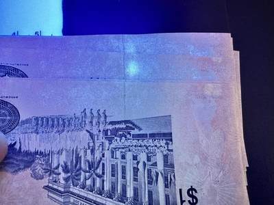 《外钞收藏家》第五百四十七期（本期稀少裸币、刀币、精品评级）（本平台长期征集拍品、欢迎藏友们联系合作） 新加坡鸟版1元 标准10连号（41-50）全新 有轻微潮斑