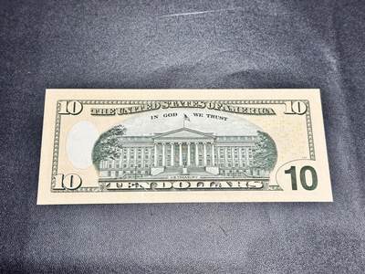 《外钞收藏家》第五百四十七期（本期稀少裸币、刀币、精品评级）（本平台长期征集拍品、欢迎藏友们联系合作） 2017年美国彩版10美元 补号 全新UNC