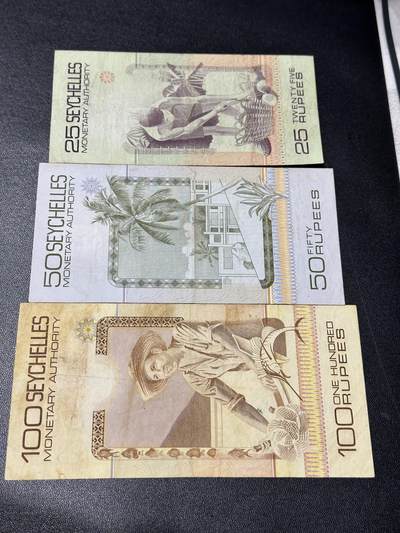 《外钞收藏家》第五百四十七期（本期稀少裸币、刀币、精品评级）（本平台长期征集拍品、欢迎藏友们联系合作） 塞舌尔25、50、100卢比  三张一起 非全新 品相如图