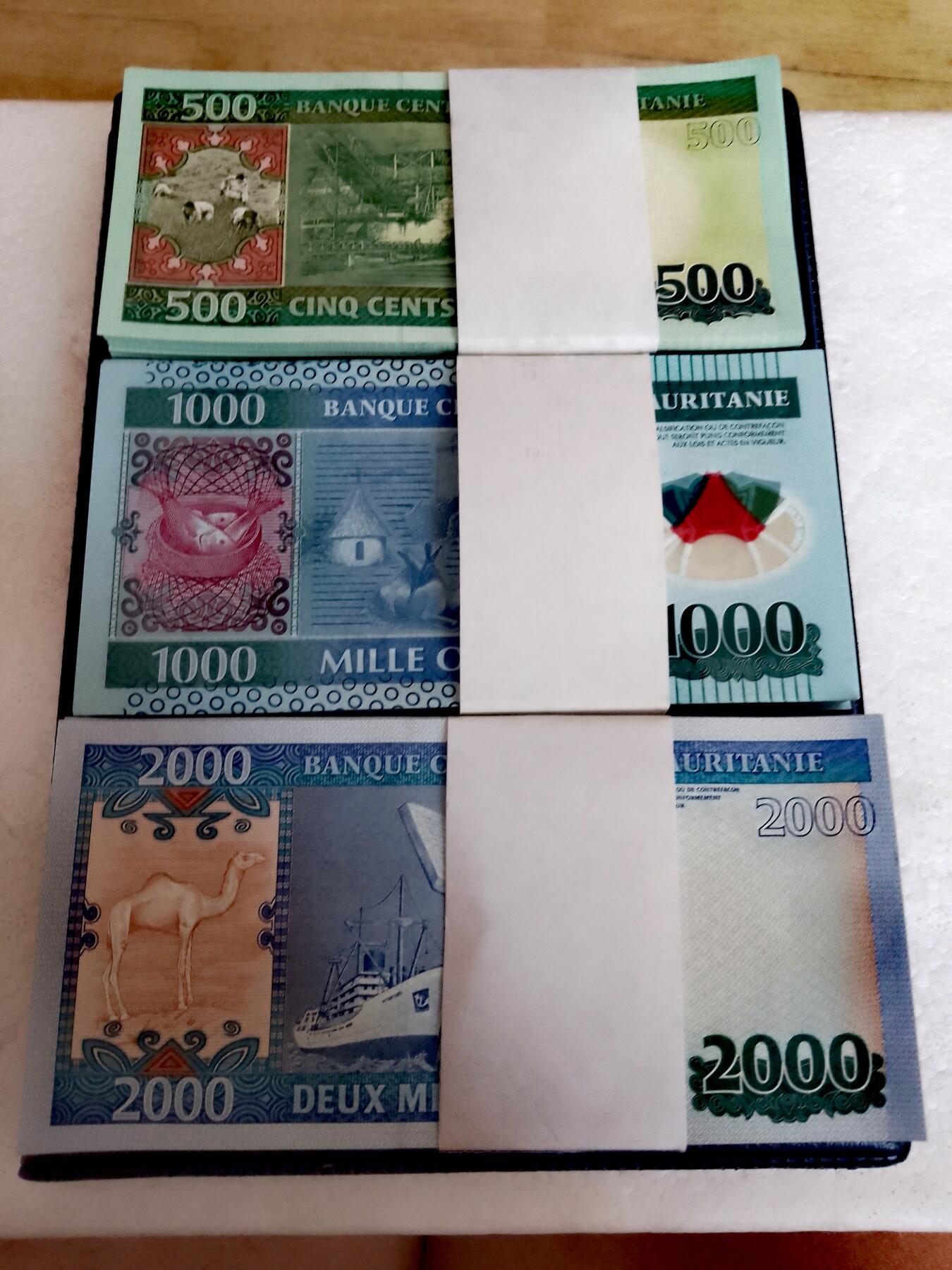 全新毛里塔尼亚2013、2014、2011年500、1000、2000乌吉亚靓品纸币89枚一叠共三叠267枚一套