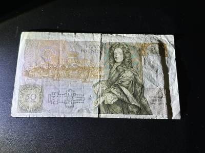 《外钞收藏家》第五百四十七期（本期稀少裸币、刀币、精品评级）（本平台长期征集拍品、欢迎藏友们联系合作） 英国D序列50镑 非全新 品相如图