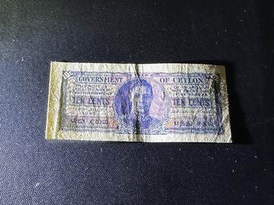 《外钞收藏家》第五百四十七期（本期稀少裸币、刀币、精品评级）（本平台长期征集拍品、欢迎藏友们联系合作） 1942年斯里兰卡10分 英皇 佐治六世 非全新 品相如图